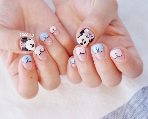 Pastel pink and blue mickey mouse nails