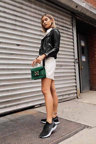 Leather jacket with white short dress