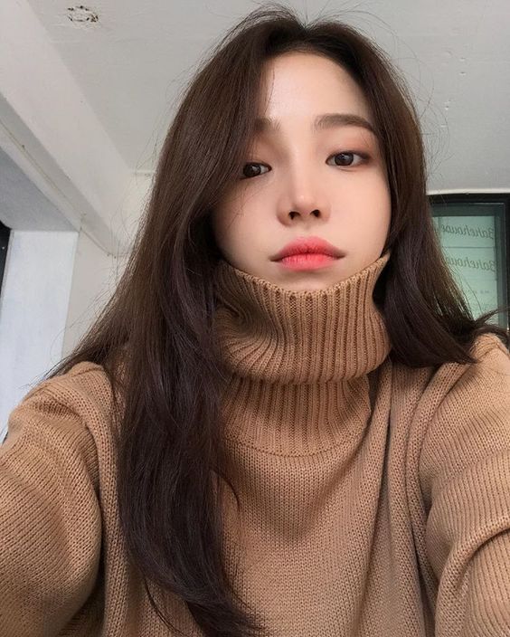 Girl selfie in brown turtleneck