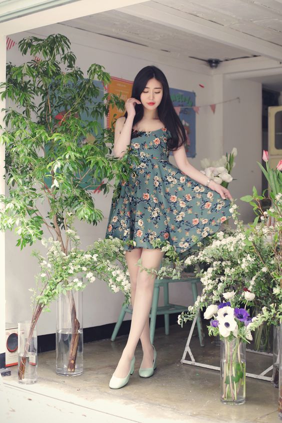 asian woman wearing a dress
