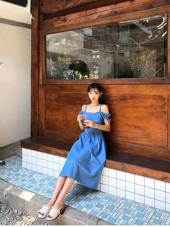 asian woman wearing a dress