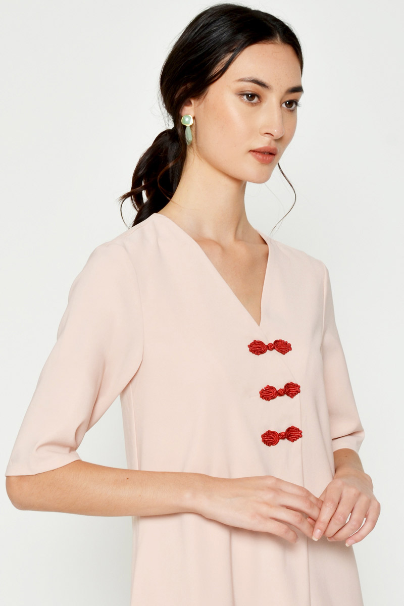 Shift dress with traditional buttons