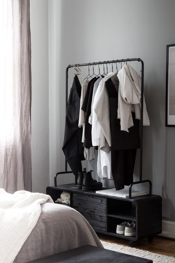 open wardrobe with black and white