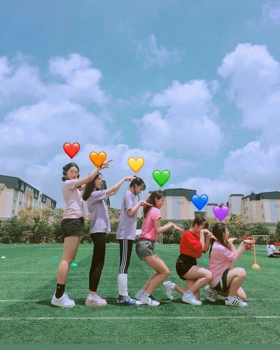 Girls with heart shapes edited into the photo