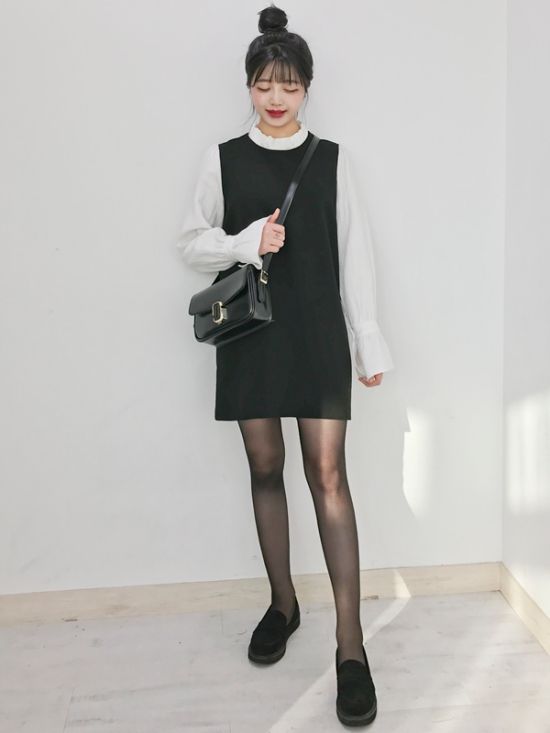 asian woman wearing a shift dress