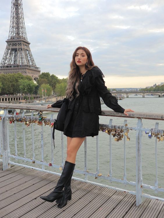 asian woman striking a flattering and slimming pose for photographs