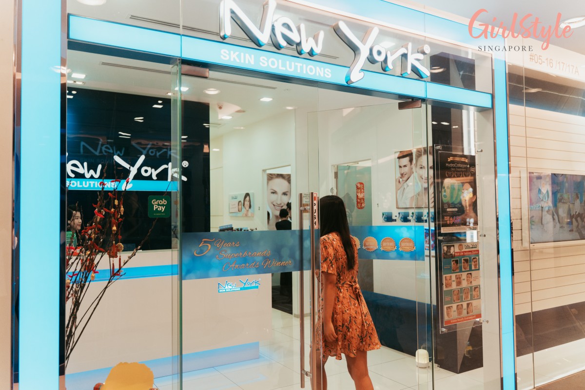 Model walking into New York Skin Solutions