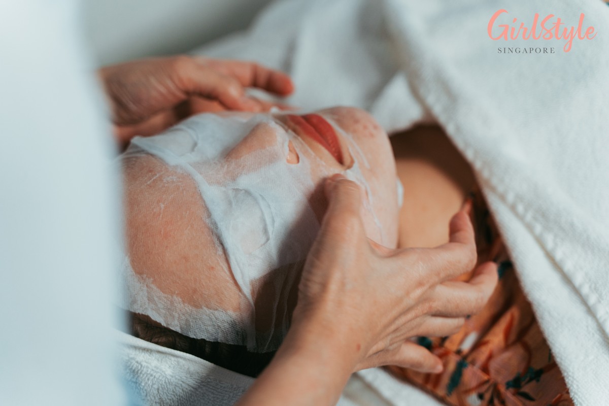 Model with mask on her face