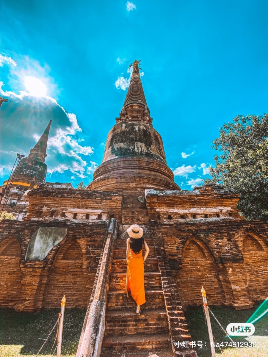Posing at the staircase of a temple