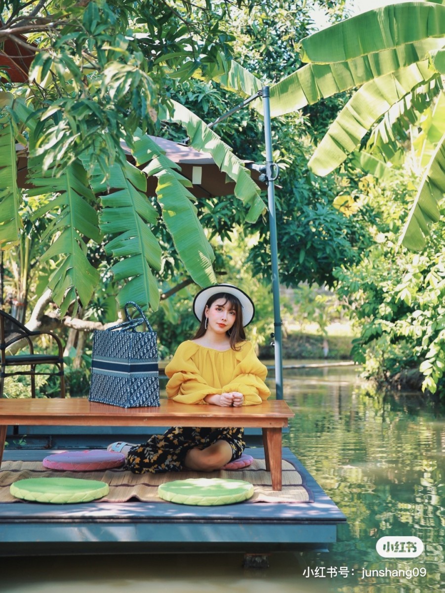 Girl sitting above the water