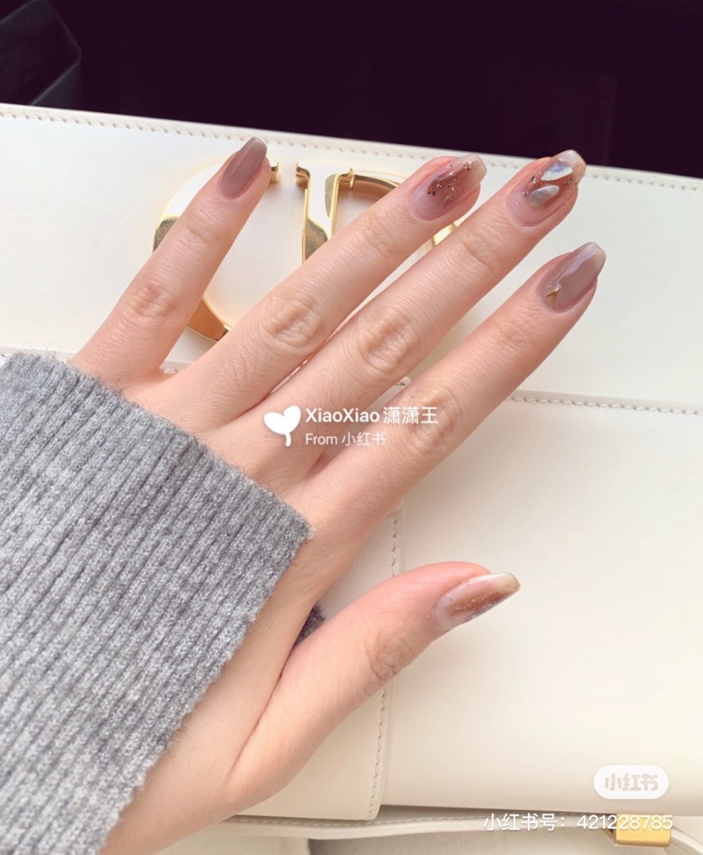 Dark brown with paint nail design