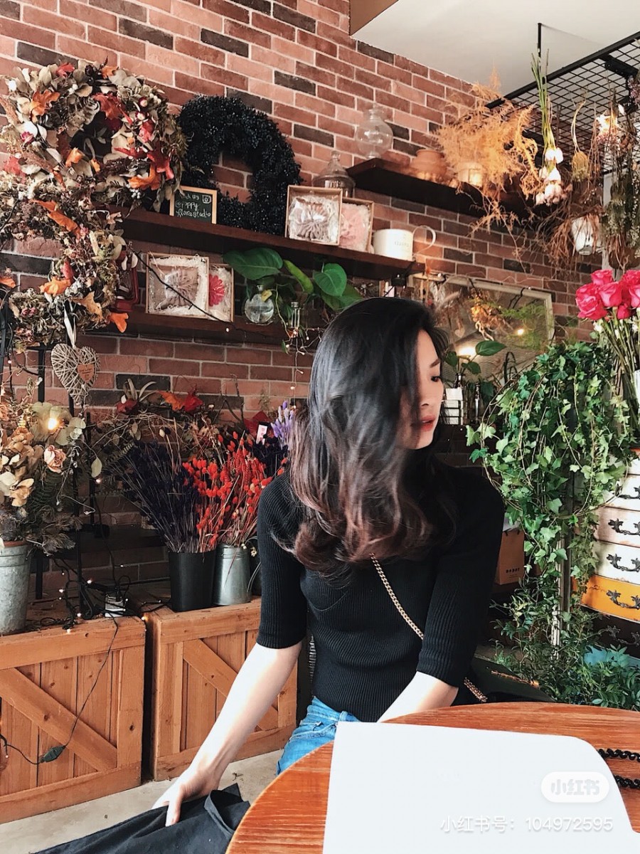 Girl sitting in Wildseed Cafe