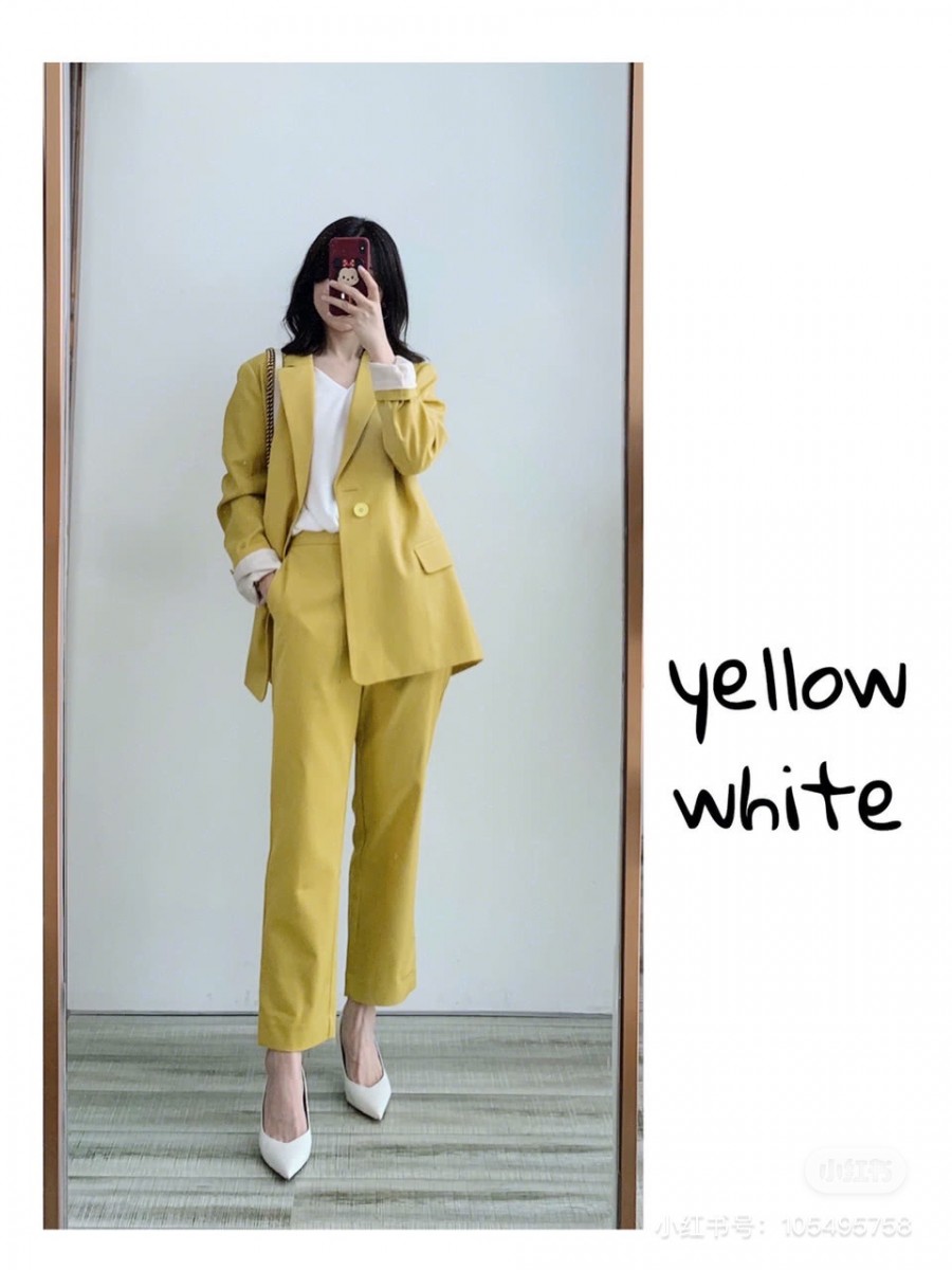 Yellow blazer and white top