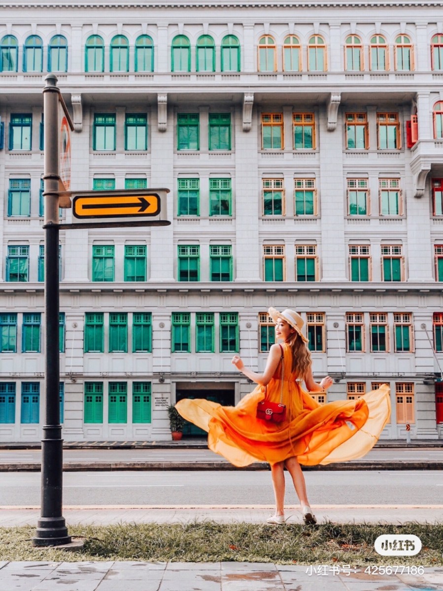 Girl posing in front of MCI
