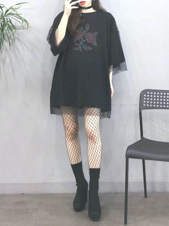 asian woman wearing a t-shirt dress