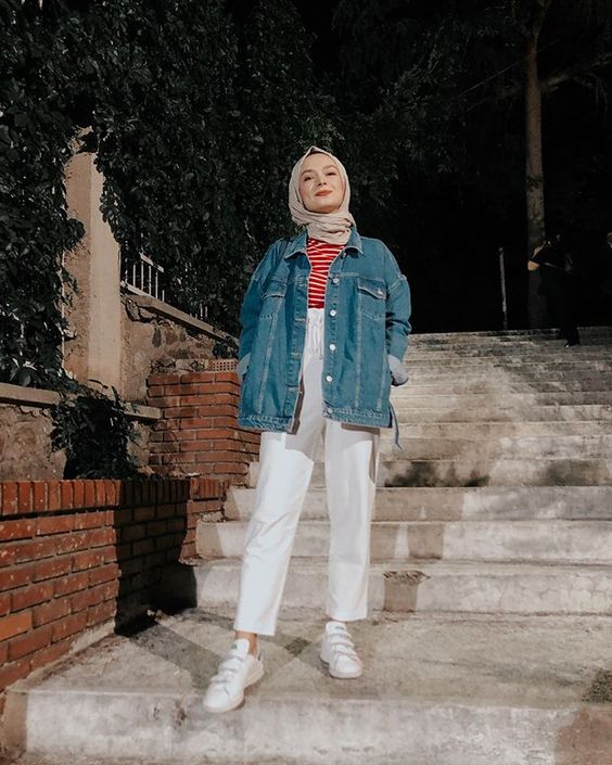 woman wearing a denim jacket
