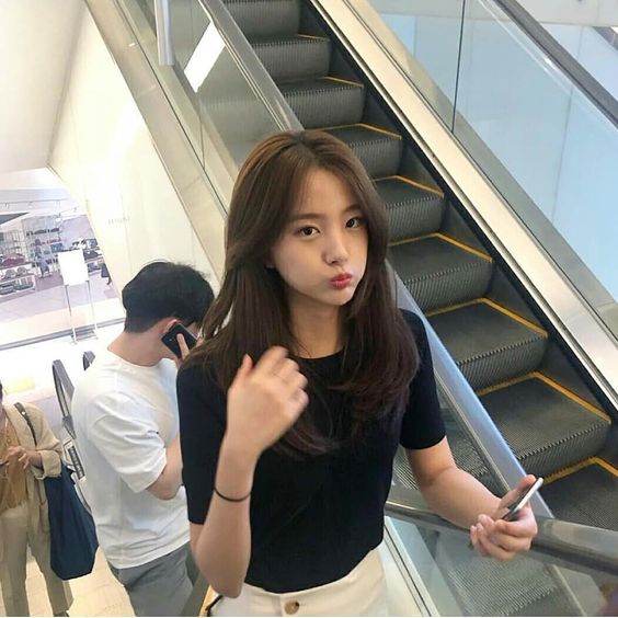 Girl on an escalator