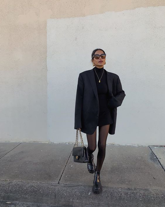 woman wearing a black blazer