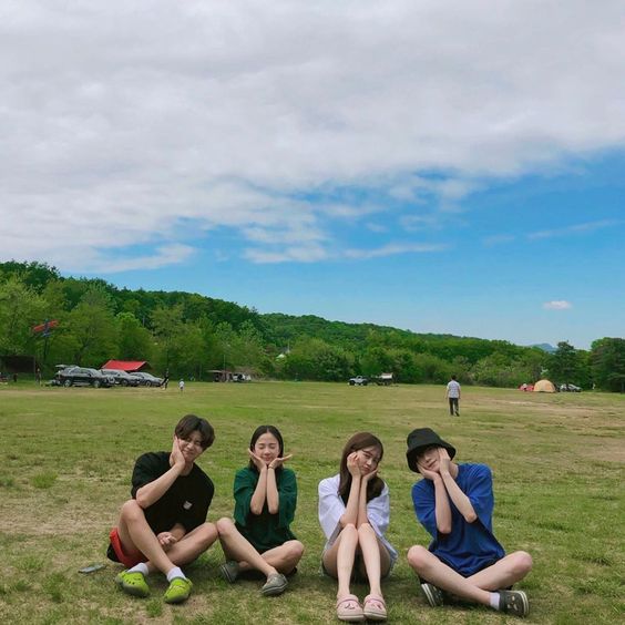 Friends sitting on grass