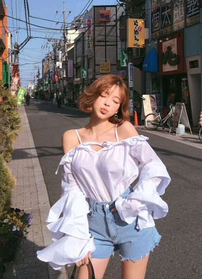 asian lady with short wavy hair