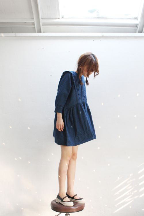 asian woman wearing a dress