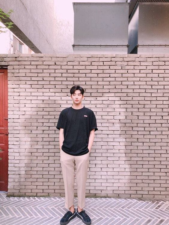 asian guy striking an easy and effortless pose