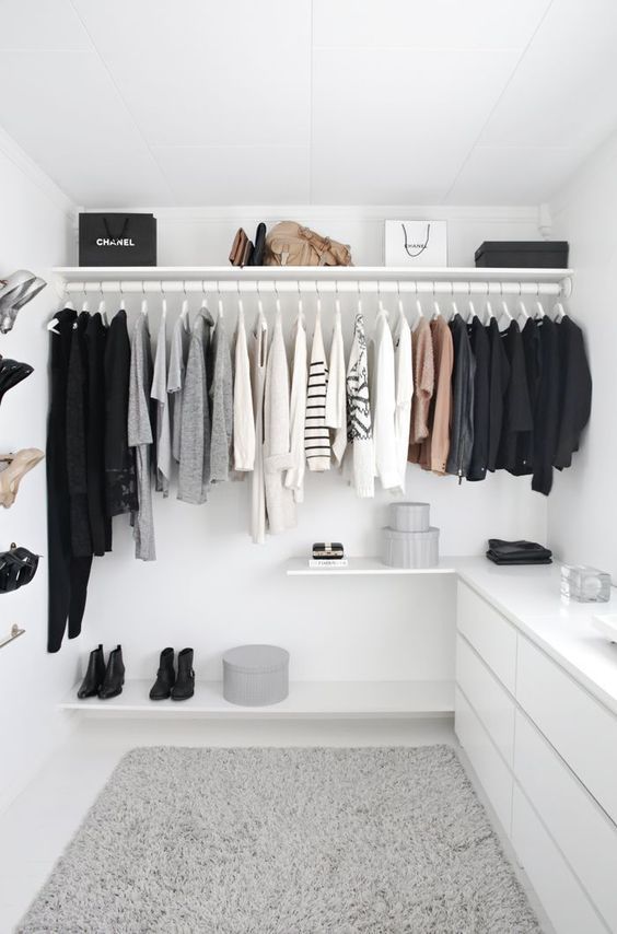 open wardrobe with neutral colours
