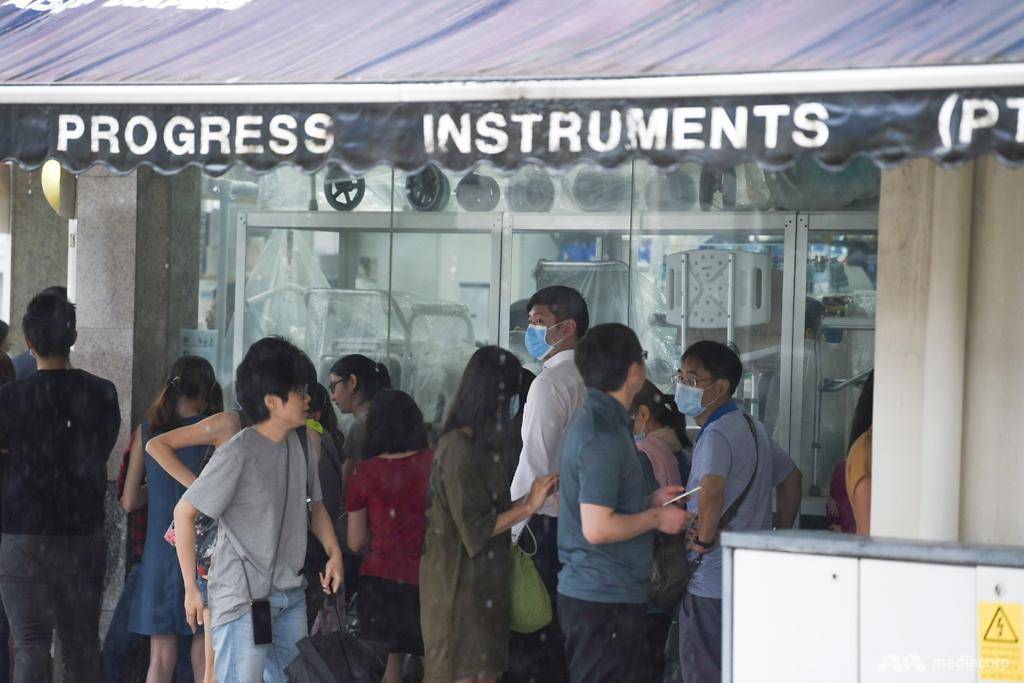 People queuing up to buy masks