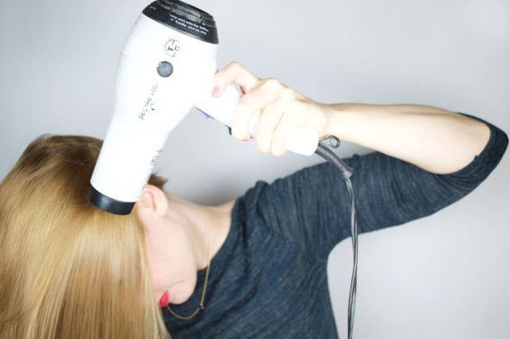 get rid of flat hair, more voluminous hair Blow dry your hair upside down