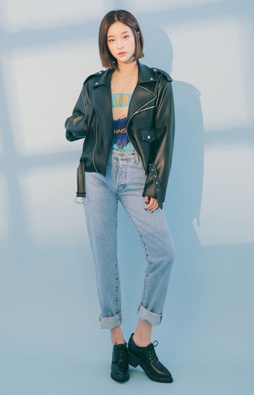 woman wearing leather jacket and jeans