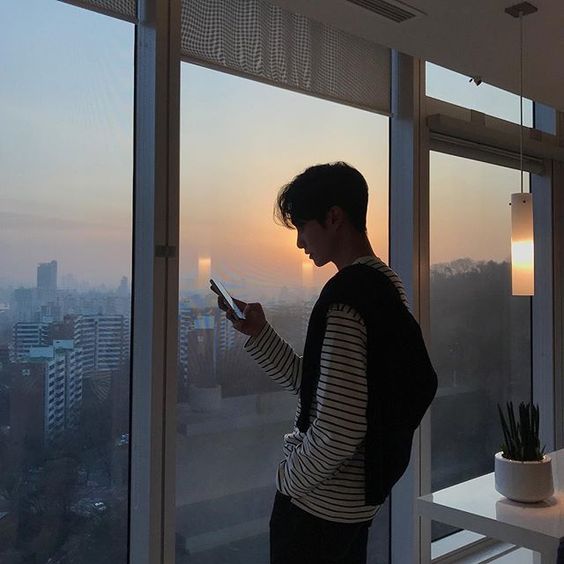 asian guy on his phone