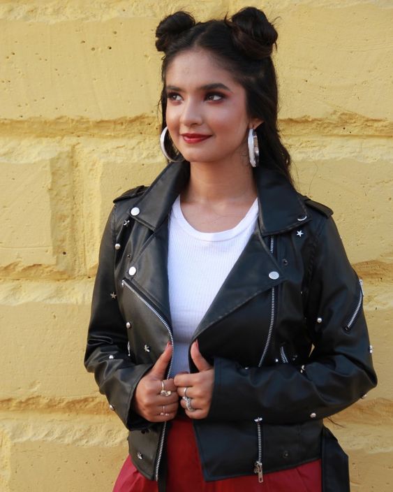 indian woman wearing a leather jacket