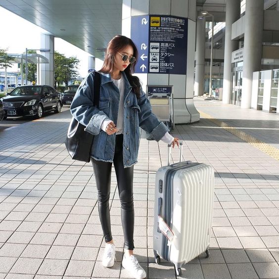 asian girl with luggage airport fashion