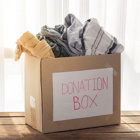 donation box filled with belongings