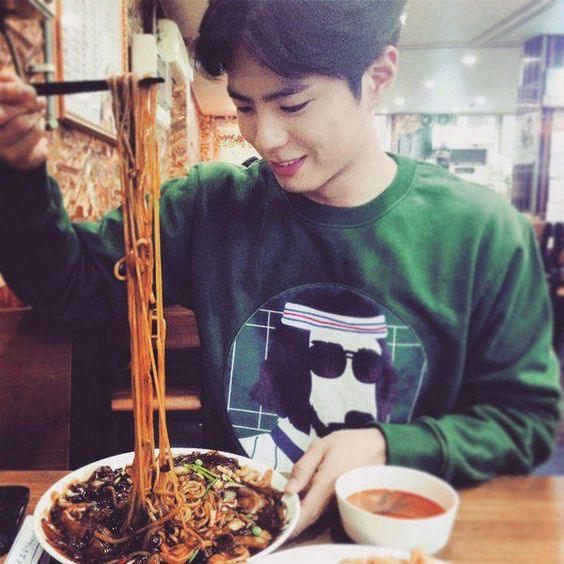 Guy eating noodles