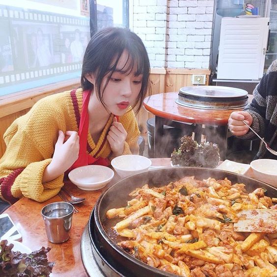 Girl looking at food