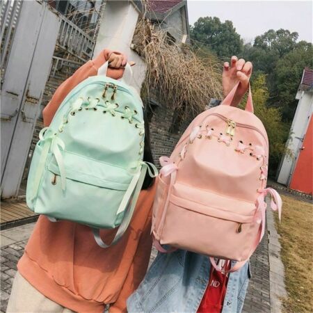 green and pink backpacks