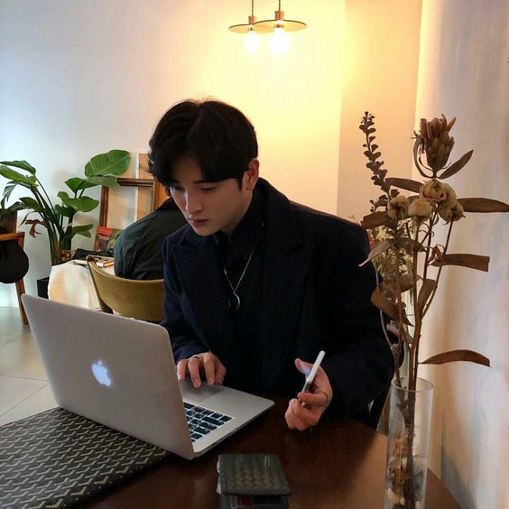 Guy working on his laptop