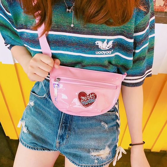girl with pink fanny pack