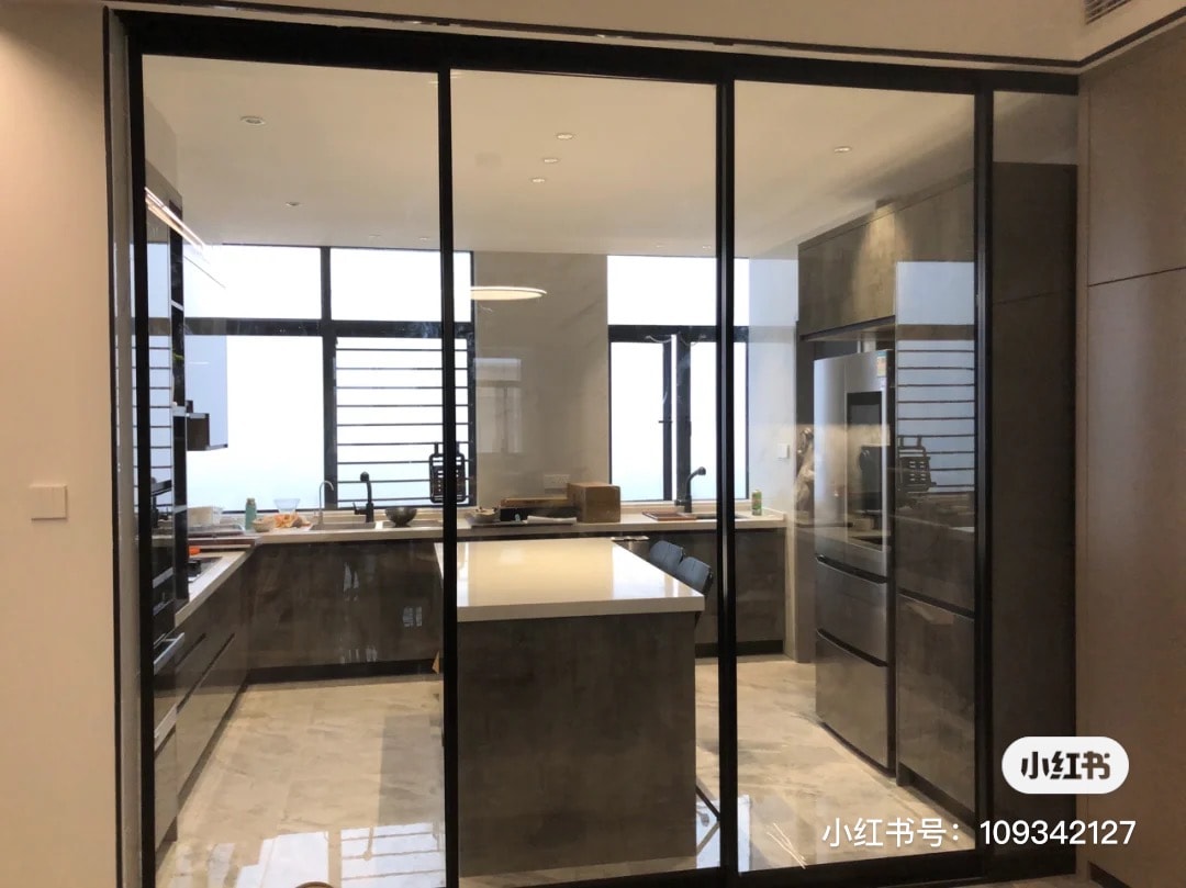 Kitchen with transparent glass doors