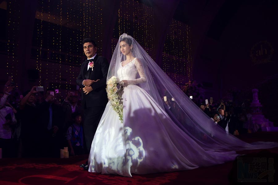 Actors Huang Xiaoming and Angelababy had an elaborate wedding