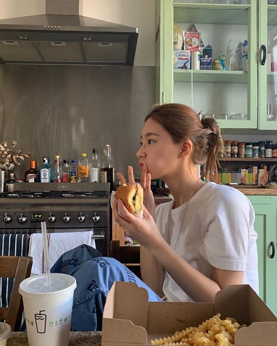 Girl eating burger