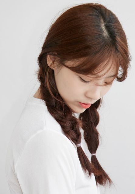 natural makeup look on korean girl with two braids