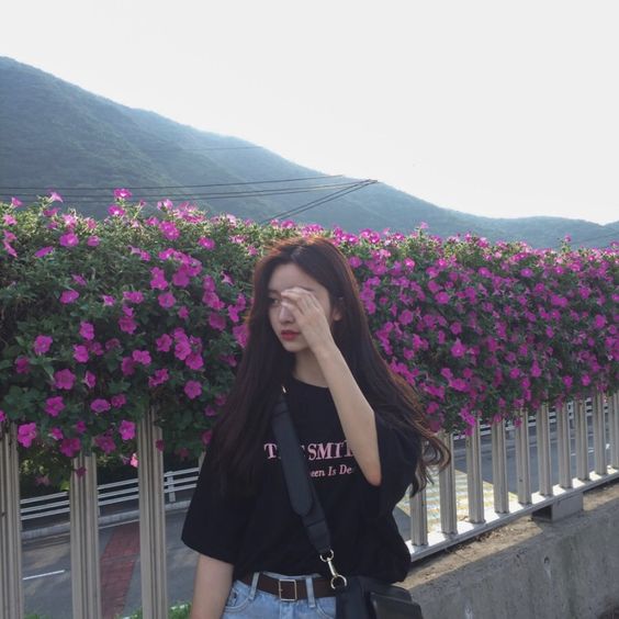 Girl covering her face