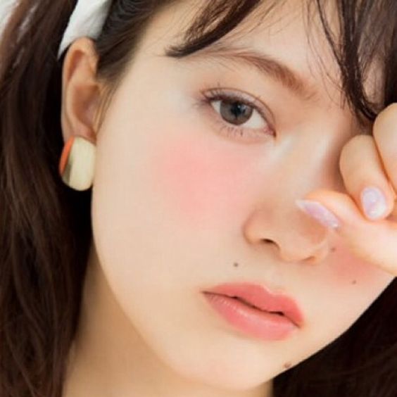 Japanese girl with blusher under her eye