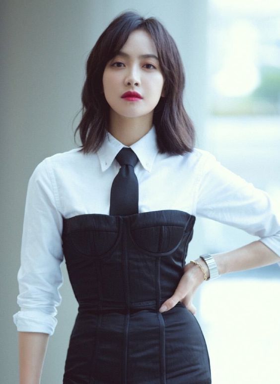 Victoria with short hair posing for a magazine pictorial