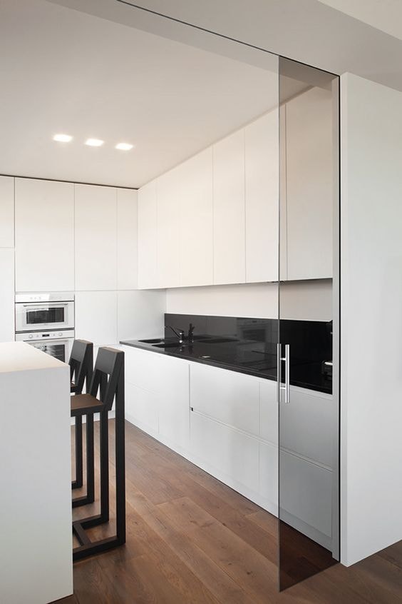 Close up of kitchen with transparent glass door