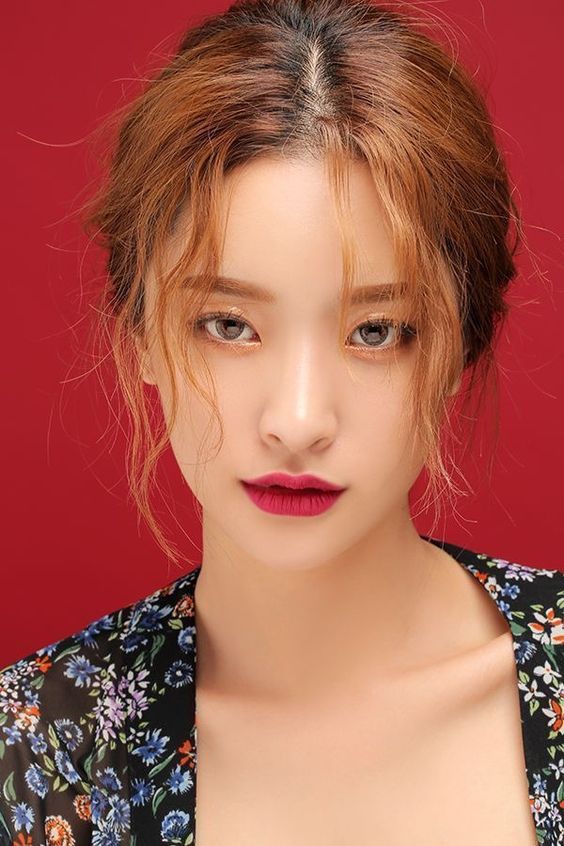 woman wearing bold red lipstick