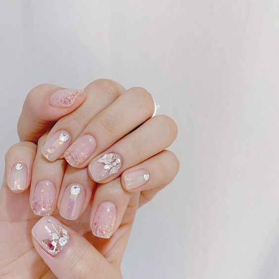 glamorous Bridal Nail Art with glitter and sparkle