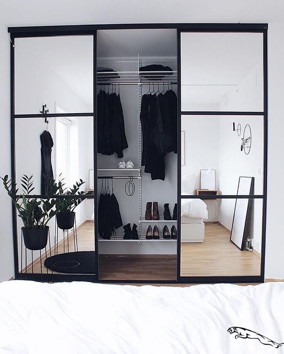 Walk-In Wardrobe In A Small HDB bto Flat room with mirror partition to make room look bigger